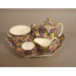 A Royal Winton batchelor's tea service comprising teapot, sugar, cream,