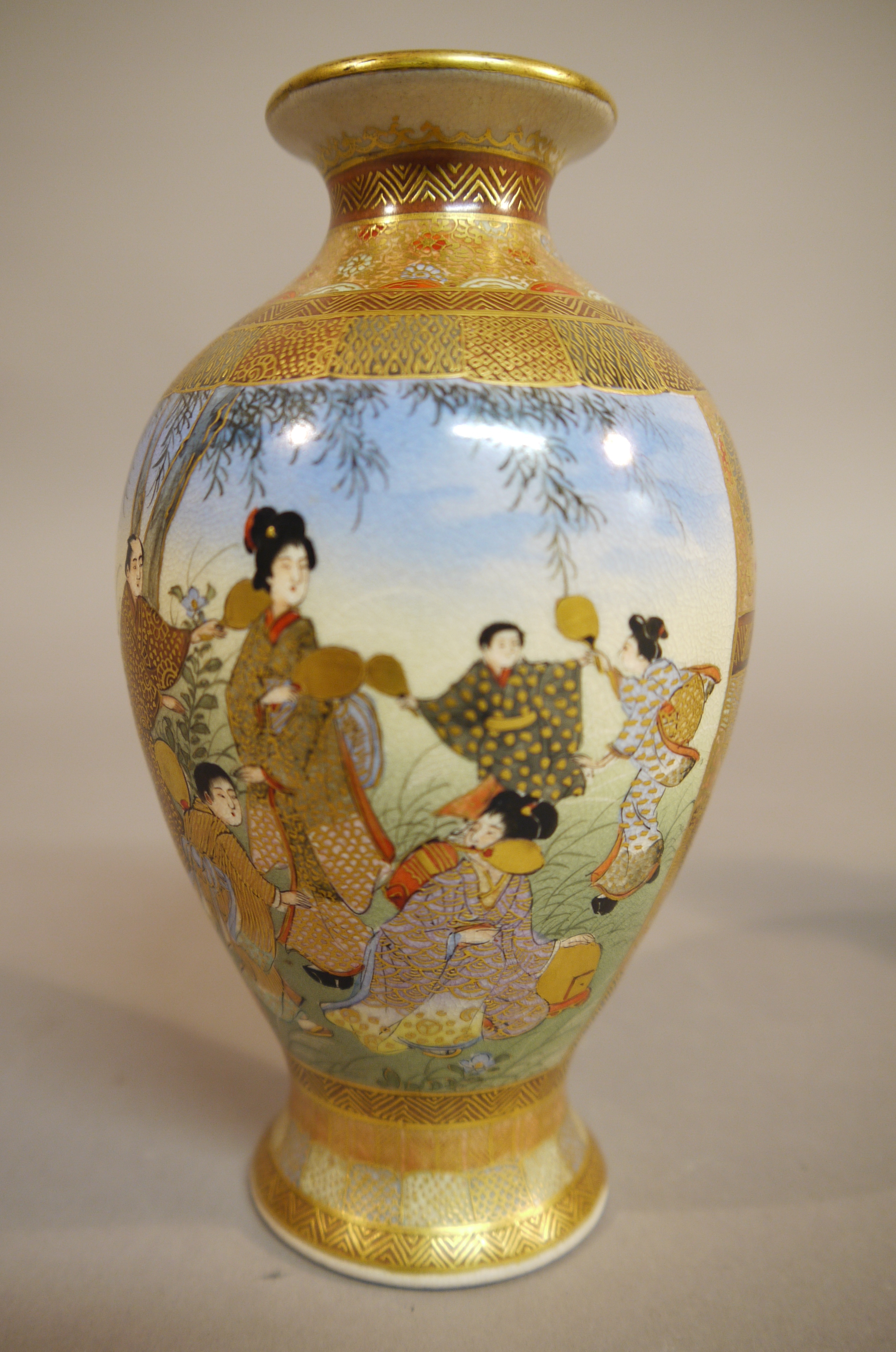 A good pair of Japanese satsuma pottery baluster vases each painted with two panels, - Image 2 of 6
