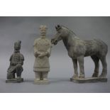 Three reproduction Chinese black terracotta figures including horse,