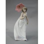A Lladro figure, Collectors Society, Afternoon Promenade, signed and dated 28.5.