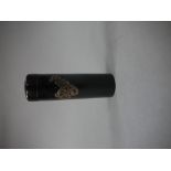 An ebonised pin box with shallow domed cover the cylindrical contained applied pins 'in silver',