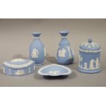 Five items of Wedgwood blue jasper clip including cylindrical jar and cover, vase, ashtray,