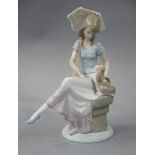 A Lladro figure, Picture Perfect, 21cm high,
