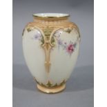 A Hadley's Worcester baluster vase of panel form painted with floral swags,