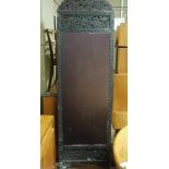 A Japanese three fold screen the frame carved with leafage the top pierced and carved with