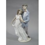 A Lladro figure: Now and Forever, 27cm high,