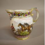 A Naples porcelain jug the body moulded in relief with hunting scene with Bacchus moulded spout,
