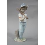 A Lladro figure, collectors society 1990, Young Baseball Player, signed and dated 23.10.