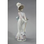 A Lladro figure: Garden Song, 20.