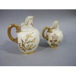 A Royal Worcester baluster jug the ivory body painted with flowers and leafage, reeded gilt handle,