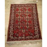 An Afghan bordered rug,