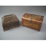 An Indian casket with panelled shaped lid painted stylised flower heads on an olive green ground,