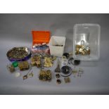 A large collection of used clock parts and spares including, stripped balance escapements,