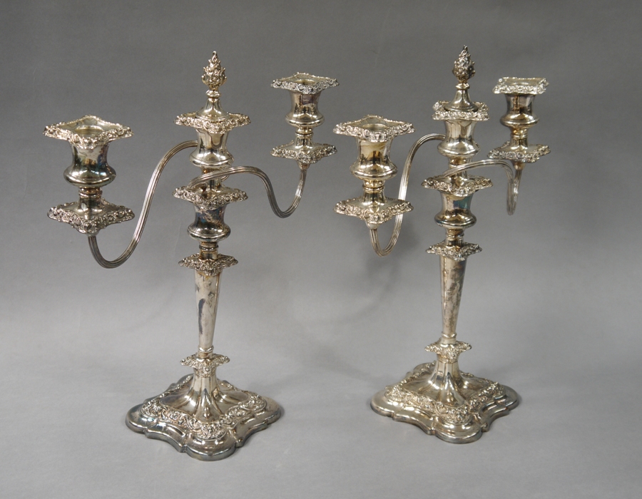 A pair of silver plated two branch candelabrum in George III style, - Image 2 of 2