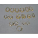 A collection of hoop earrings all in 9ct gold and yellow metal (test as 9ct gold),