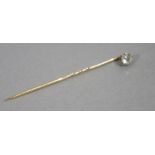 An Edward VII diamond tie pin, in 15ct yellow and white gold,