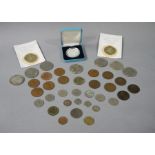 A quantity of commemorative crowns, pennies,