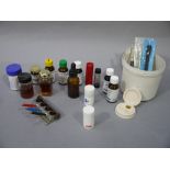 A collection of watch and clock lubricants and oils including,