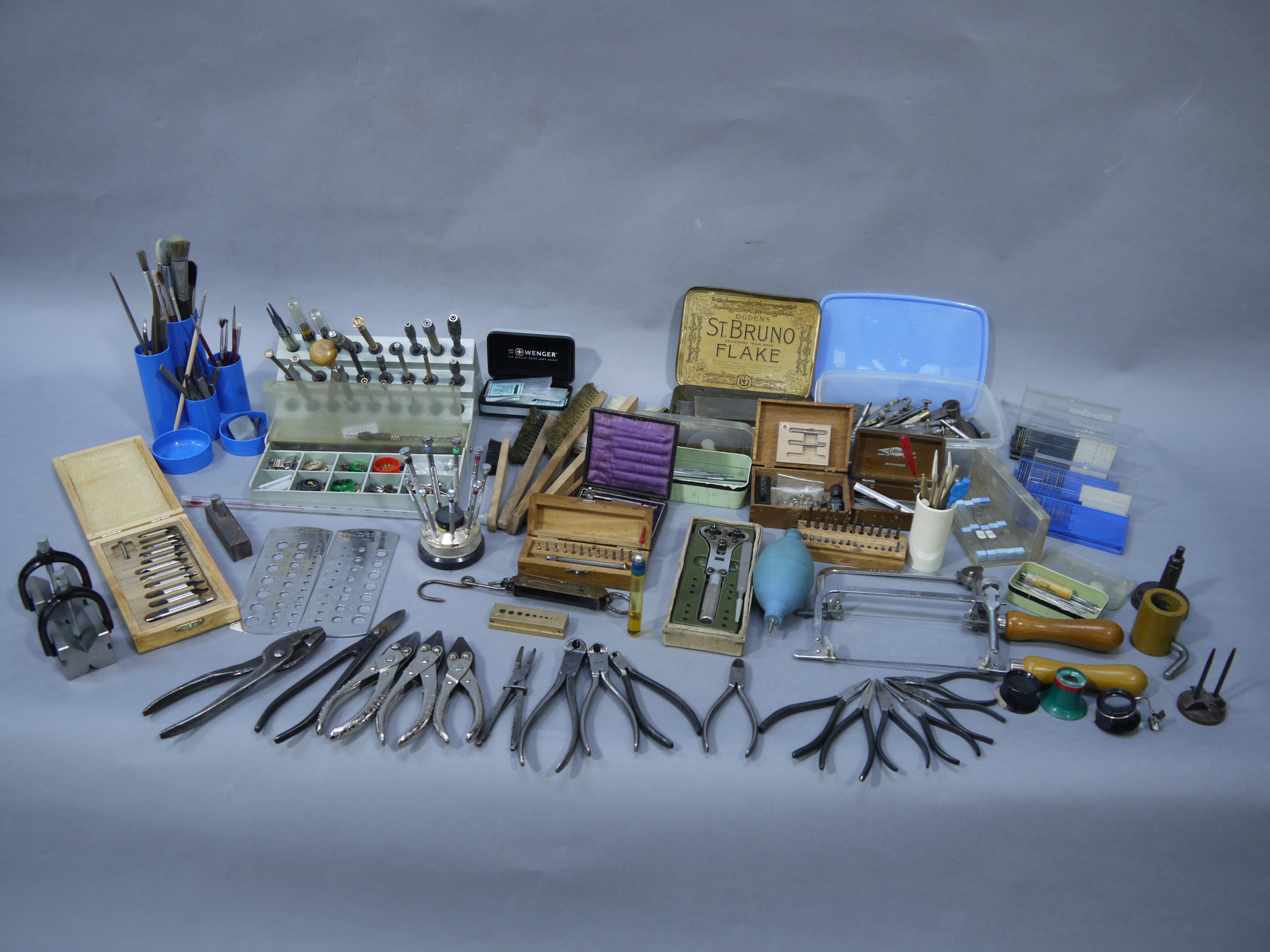 A large collection of clock and watch makers hand tools including,