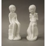A pair of Spode figures, Rebecca and Michael by Pauline Shone, 21cm high,