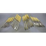 Two sets of dessert knives and forks,