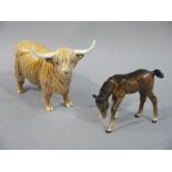 A Beswick long horn cow, 20cm wide overall; a Beswick foal, 8.