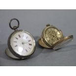 A Victorian foliate engraved silver fob watch and a 9ct foliate engraved fob watch (2)
