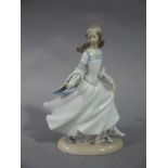 A Lladro figure of Cinderella,