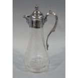 An Edwardian wheel engraved claret jug with silver plated mount, acorn knop,