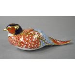 A Royal Crown Derby model of a pheasant decorated in Imari palette, 17cm wide,