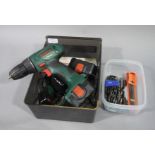 A plastic box containing a quantity of hand tools including drivers, drill bits, squares rulers,