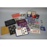 A box containing miscellaneous coins including 1970 and 1971 proof sets, 1953 'plastic',