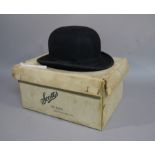 A Lock and Co, hatter's St James Street London bowler hat contained within a Scotts,