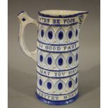 An interesting Wedgwood jug the slightly tapered cylindrical body moulded in relief with bands of