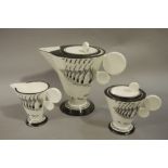 A reproduction Dean Sherwin hand decorated Six Town pattern three piece tea service comprising