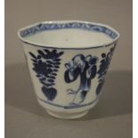 A Chinese blue and white octagonal panelled tea bowl of tapered form with circular foot,