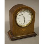 An Edwardian inlaid mahogany mantel clock circular white enamelled dial with Arabic numerals,