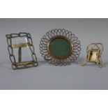 Three early 20th century photograph frames, one of curb links,