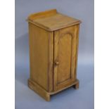 A Victorian satin walnut pot cupboard