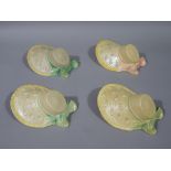 Four Brentleigh ware wall pockets moulded as ribbon tied bonnets, 18.