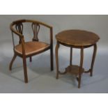 An Edwardian mahogany tub back occasional chair with lyre shaped splats together with a circular