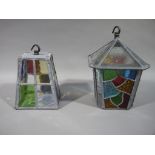 Two vintage colour and clear glass leaded lanterns