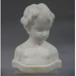 An alabaster bust of a young child on plinth base,