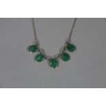 A malachite and silver necklace,