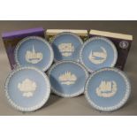 Six Wedgwood blue jasper dip Christmas plates, various designs and dates,