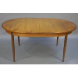 A 1960/70s G-Plan teak extending dining table