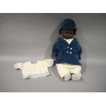 An Armand Marseille bisque headed black baby doll having sleeping eyes, painted features and hair,