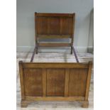 A 1930's oak panel end single bedstead