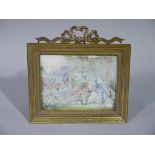 Ivory panel painted with 18th century courtiers in a landscape,