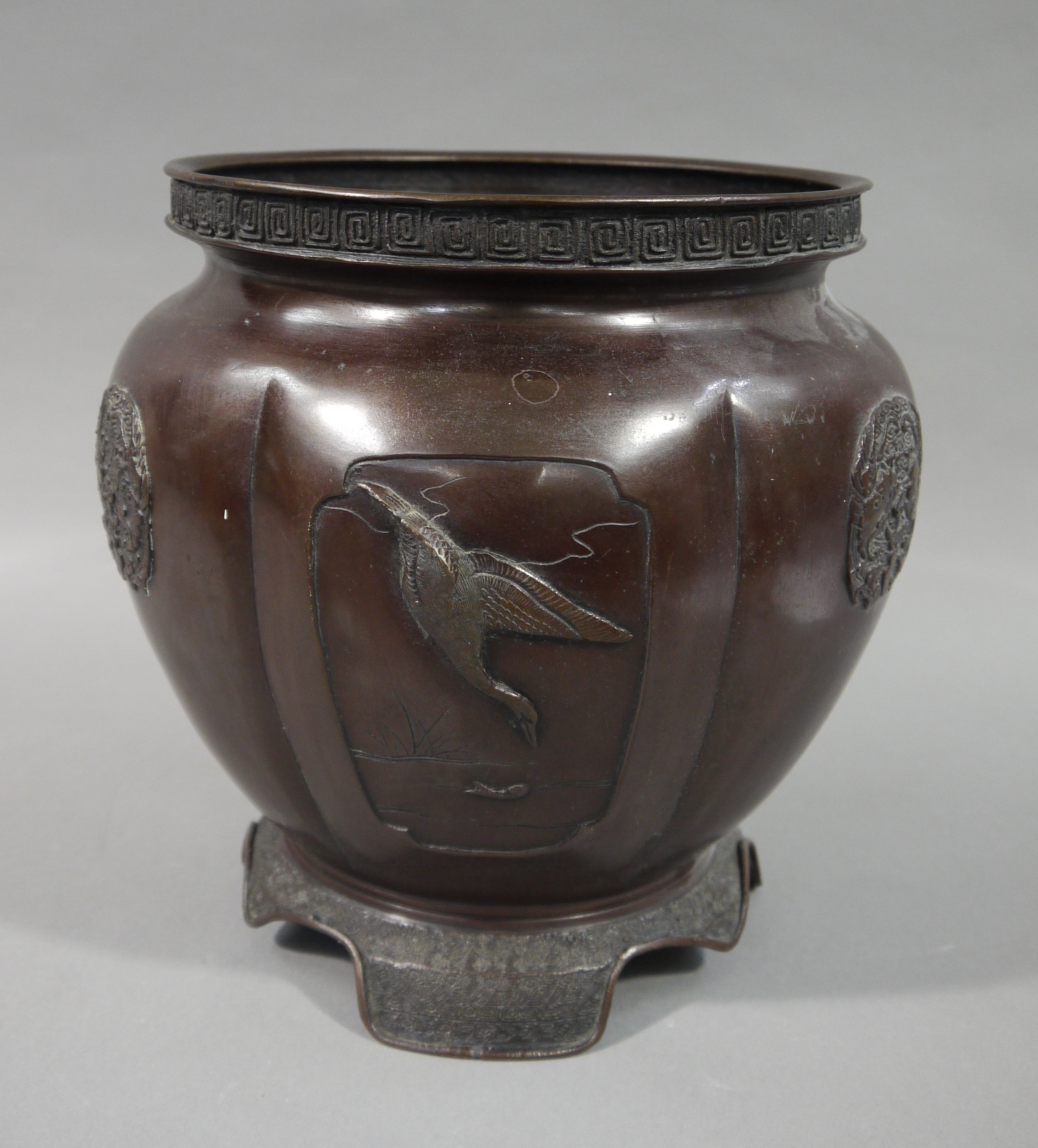 A Japanese bronze jardiniere of circular lobed outline decorated in relief with panels of waterfowl - Image 2 of 3